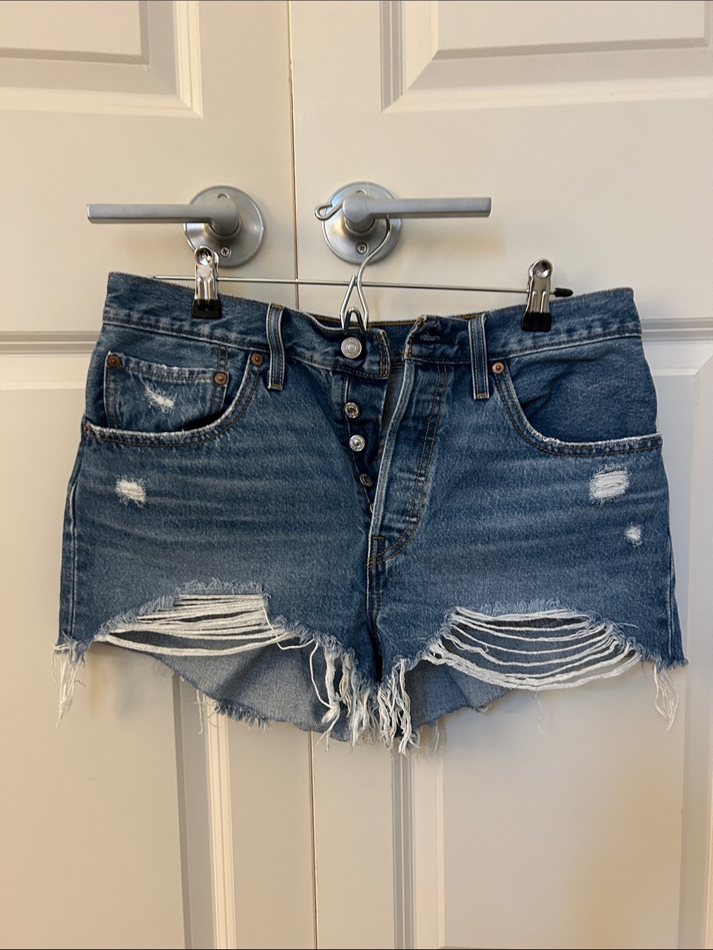 Levi's Distressed Medium Blue Denim Cutoff Shorts